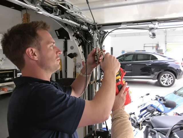 Hacienda Heights Garage Door Repair safety certified technician performing cable replacement in Hacienda Heights