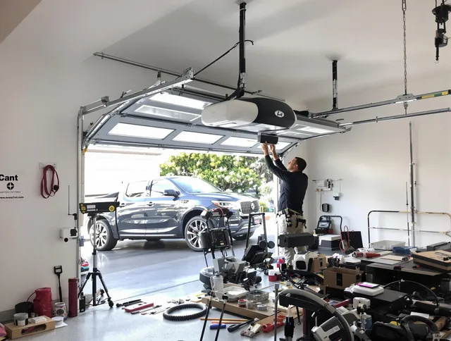Hacienda Heights Garage Door Repair specialist installing smart garage door opener system in Hacienda Heights home